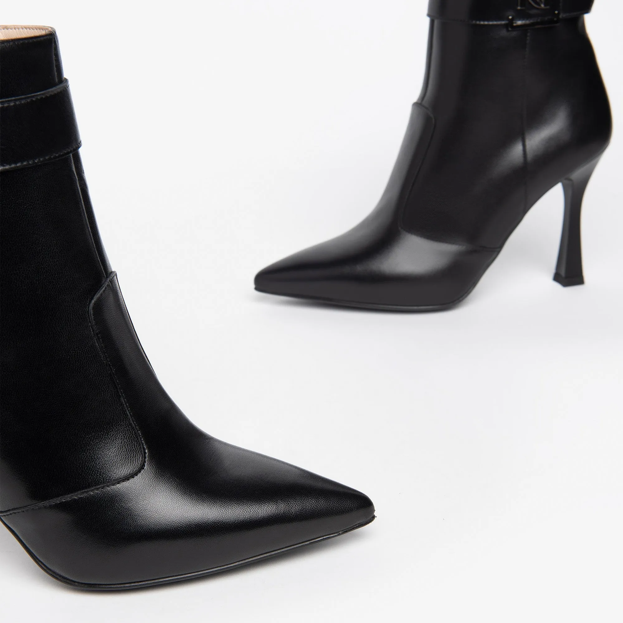 Elegant NeroGiardini Black Leather Heeled Ankle Boots for Women